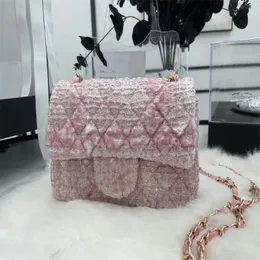 Borsa di design Borsa a tracolla singola con catena con fibbia in oro intrecciato con motivo a diamante, la bustina rosa è troppo adatta per l'uso quotidiano A412