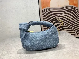 Latest design cowboy knot woven bag and with a senior design style, using big denim hand-woven heat simple is not simple shoulder bandwidth and thick