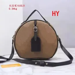 Luxur Designer Boite Chapeau Round Cake Cowhide Crossbody Nano Handväskor Kopplingar Kvinnliga telefonkamera Purses Makeup Bag Dhgate axelväskor Nytt mode