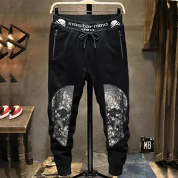 Skull Drukuj Spodnie Męskie Średnie Designer Talia Rhinestone Micro Elastic Black Youth Street Style Męski Pasek Elastyczny 242W