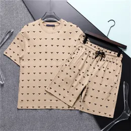 23SS herres designer spårar sommarstrandshorts pullover sportkläder set tryck grossister kvinnor mode casual utomhus löpning t-shirt korta ärmdräkter