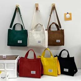 Moda bolsa de ombro feminina de veludo cotelê nova bolsa de compras simples e ecológica tendência bolsa mensageiro versátil bolsas para mulheres 2023