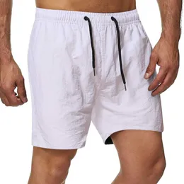 Mäns shorts mäns casual shorts 2023 sommar ny man tunn capris 10 färg snabb torkande strand fast färg byxor elastisk midja vit svart blå l230719