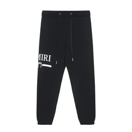 Herrbyxor designer mens brev tryck avslappnade män kvinnliga träningsdräkter joggar pant mode hip hop elastic midjebyxor droppleverans dhfz6