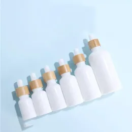 Branco de porcelana e reagente líquido Gotes de gotas de gotas de óleo redonda de óleo essencial de perfume com tampas de bambu de madeira GBQVU