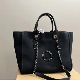 Designerska torba na wycieczkę gorąca sprzedaż średnia torba skórzana torebka na płótnie Ulubione kobiety projektanci Kobieta luksusowa torebki duża torba z łańcuchową torbą na zakupy