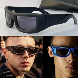 Vulkanit solglasögon Rektangulär blå designer solglasögon oer1074 Mensacetatfiberram Blå lins präglad med logotyp Womens Party Travel Bounce Glasses