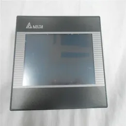 1 جهاز كمبيوتر بالقرب من New Delta HMI Touch Panel DOP-B03E211 في المربع المعجل 221L