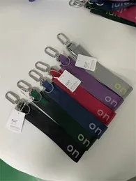 Lu Fashion Yoga Keychain förlorade aldrig kvinnors fiess som kör elastiska nyckelkedjor Hög kvalitet