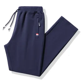 Męskie spodnie letnie spodnie męskie fitness Sportswear dres elastyczne talia dresowe bawełniane spodnie luźne siłowni jogger track