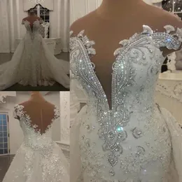 Blygsamma sjöjungfru bröllopsklänningar med löstagbar kjol som lyser paljetter kristallpärlor applikationer ren nacken rygglös lång brudklänning294o