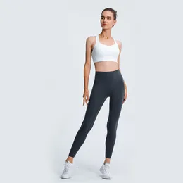Roupas de ioga calças nuas de tecido adequado para a pele das mulheres roupa exterior corpo esportivo calça de ioga mesmo estilo
