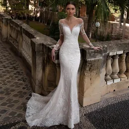 2021 Illusion Bridal Stuns V Neck Pełne rękawy Odłączona spódnica Syrenka Zastosowane krystalicznie koronkowe sukienki ślubne 230W