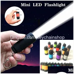 Schlüsselanhänger 12 Farben Tragbare Mini-Taschenlampe USB Wiederaufladbarer Schlüsselanhänger LED Kleines starkes Licht Wasserdichte Reise Elektrische Taschenlampe Drop De Dhrdc