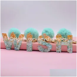 Nyckelringar 26 Initialer Letter Nyckelring Pendant Party Favor With Green Fluffy Ball Fashion Women Girls Handbag Glitter Gradient Harts Al DHGS7