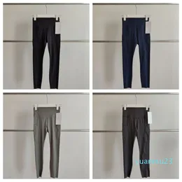 Lu Solid Color Women Women's Yoga Pants High Weist محاذاة اللياقة البدنية مجموعة من الجوارب اللياقة البدنية المرنة لليوغا الرياضة في الهواء الطلق