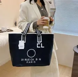 더플 백 디자이너 브랜드 검은 흰색 쇼핑 가방 여성 삼각형 라벨 방수 레저 여행 가방 대용량 나일론 엄마 토트