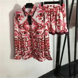 Tasarımcı Giyim Kadınlar Traild İki Parçalı Etek Takım Vintage Baskılı Yakası Uzun Kollu Bluz Yüksek Belli Kısa Etekler Lüks Konfor Partisi Gezi Kadın Gömlekleri