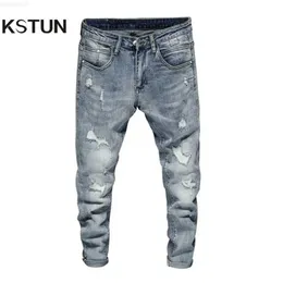 Zagrypowany męski jasnoniebieski w stylu High Street Męska elastyczność Slim Fit Frayed Casual Men Pants Spodnie dżinsy 210318 L230726