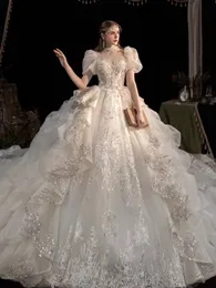 Abiti da sposa di lusso con perline di cristallo Sweetheart Abiti da sposa con fiocco grande indietro robe de mariage Appliques di pizzo su misura Abiti da festa da sposa taglie forti Abito da sposa lucido bling