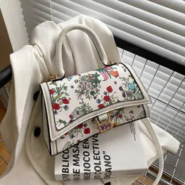 2023 Ny fabriksdirektförsäljning Högkvalitativ liten fyrkantig axel Kvinnors populära mode crossbody casual elegant tryckt väska för kvinnor