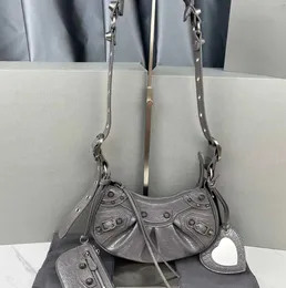 Le Cagole series half moon dumpling bag willow stud motorcycle fine-grained crocodile pattern leather with heart-shaped makeup mirror shoulder Cross Body