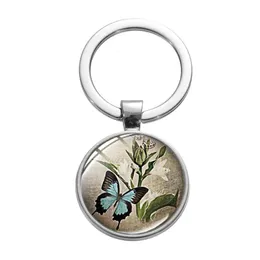 Keychains Lanyards New Vintage Blue Butterfly Keychain Glass Cabochon Sier Plated Key Chain Flower Print Elegant Women Girl Trinkets Dhqbl