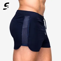 Men Shorts Bieganie rozciągającą siatkę do joggingowe spodenki Lato Szybki suchy trening gimnastyczna z kieszeniami