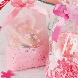100 st 16x26 cm rosa körsbärsblomstryck transparenta presentförpackningar PASKS Plastpåse för godis och godis jul wrap2089