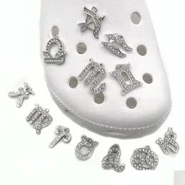 Akcesoria części buty 12 Constellation Series Metal Bling Clog Charms Jibitz Dekoracja Pins Button Pins Losowo dostawa