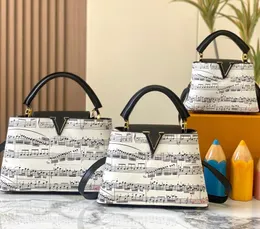 Sacolas de grife Moda Bolsas com símbolo musical Capucines Série Bolsa com aba Bolsa de ombro de luxo Bolsa feminina com alça superior Bolsa tiracolo pequena Satchels Bolsa