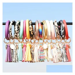 Schlüsselanhänger Lanyards Frauen Quasten Armbänder PU-Leder Party Wrap Schlüsselanhänger Leopard Lilie Druck Kette Armband Sonnenblume Tropföl Circ Otff4