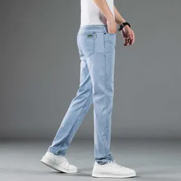 мужские джинсы Мужские джинсы дизайнерской роскоши Тот же летний мужской элитный бренд в торговом центре, тонкие джинсы с высокой талией, легкие деловые универсальные брюки, свободная микроэластичная резинка