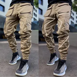 Kargo harem pantolon erkek hip hop sokak kıyafeti gevşek çoklu cepler yansıtıcı şerit pantolonlar rahat düz tüp erkek pantolon moda harajuku joggers eşofman