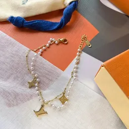 Designer-Schmuckarmbänder Charm-Armband mit Goldbeschlägen für Damen, Handschlaufe, braunes Blumenmuster, Logo-Stempel, bedruckt, modisches Geschenk
