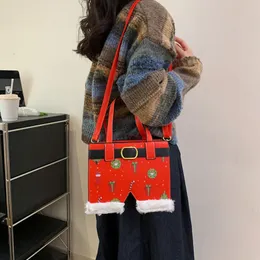 Kreativa handväskor kvinnor väska fashionabla original minoritet en axel crossbody väska avancerad känsla tygväska söt gril handväska jul röd plysch tryck