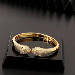 Braccialetto di tendenza moda animale leopardo braccialetto creativo hip hop personalizzato micro intarsiato zircone aperto da donna 231101
