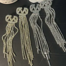 Urok kolczyki sier platowane diamentowe łańcuchy Dangle moda butik projektant biżuterii