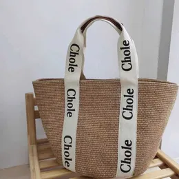 Bolsa de grife Bolsa de praia Bolsa de palha de malha 2023 Novo verão de alta capacidade Casual de malha Bolsa grande portátil para meninas