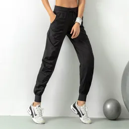 LULUS Fashion-Women Yoga Roupfits Studio Pants Ladies Rapidamente Decas Disprezando Correr Sports Sports Studio de dança Loose Jogger Girls Yoga Pants Fitness Gym Fitness