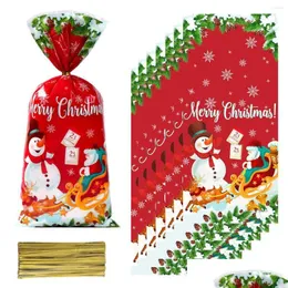 Juldekorationer Juldekorationer 25/50/100st Santa Claus Snowman Candy Väskor Plastispåse Merry 2023 Noel gåvor År 20 DHWG6