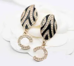 2023 Luxury Quality Charm Drop Earring med Sparkly White Diamond Oval Shape Design Have Stamp Black Style PS4794A