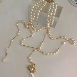 Desginer Viviene Westwoods Empress Dowager Vivian Anne's Broken Pearl Multi Layered Tassel Saturn Necklace for Women's High Grade Asymmetric Pearl Sweater Chain