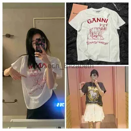 女性のニットティー2023夏の新しいプリントキャットプリント半袖ラウンドネックカジュアル汎用ルーズTシャツトップ女性J231103