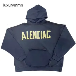 Diseñador sudaderas con capucha hombres sudadera con capucha Balencigaas suéter para hombre sudadera versión correcta París cinta amarilla versátil hombres mujeres versátil vendaje de papel abrigo suelto QE1O