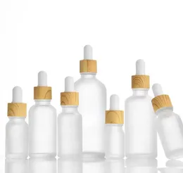 Partihandel Frosted Glass Essentialoljor Parfymflaskor med Woodgrain Cap Reagent Pipette Eye Droper Aromaterapi Liquid Containers
