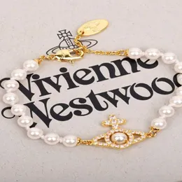 デザイナーVivienen Westwoods Jewelry Bracelets Hollow Saturn Pearl Bracelet Womens French Classic Planet Cross Pearl Bracelet High 22363