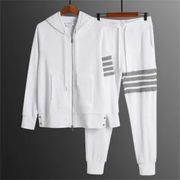 Tute da uomo Abbigliamento economico Pantaloni Sconto del 50% Primavera Autunno Nuovo stile Cerniera Camicia a maniche lunghe con cappuccio Maglione Tuta sportiva casual e pantaloni da coppia da donna