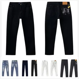 Jeans da uomo impilati firmati da uomo stampati jacquard con foro dritto lavaggio patchwork irregolare patch ricamo tessuto elasticizzato High Street lavato