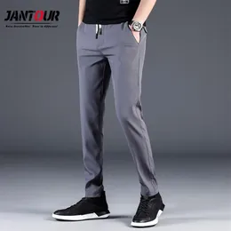 Calças de verão dos homens magro estiramento coreano calças casuais fino ajuste chino cintura elástica jogger vestido calças masculino à prova dwaterproof água thin284j